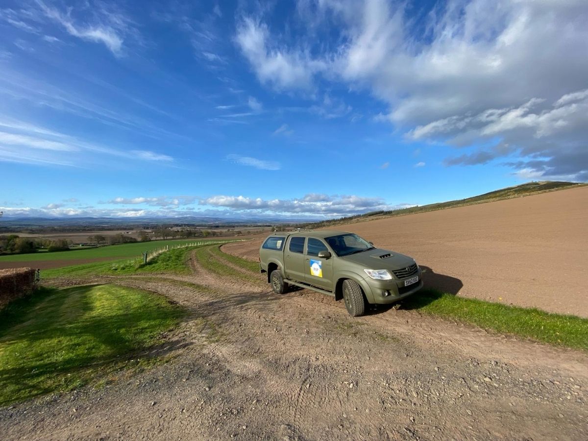 A Pickups for Peace vehicle on a countryside track
