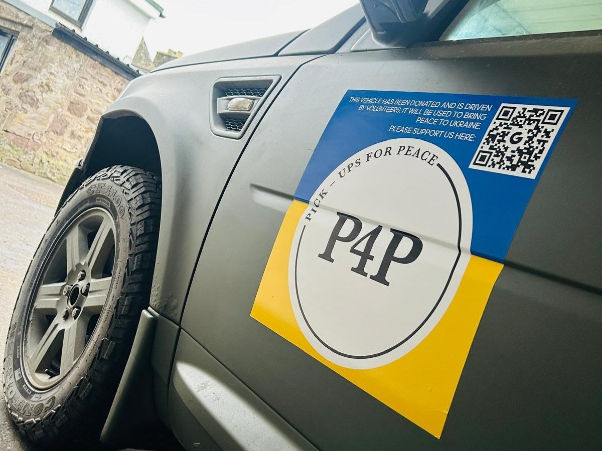 Pickups for Peace sticker on the side of a vehicle