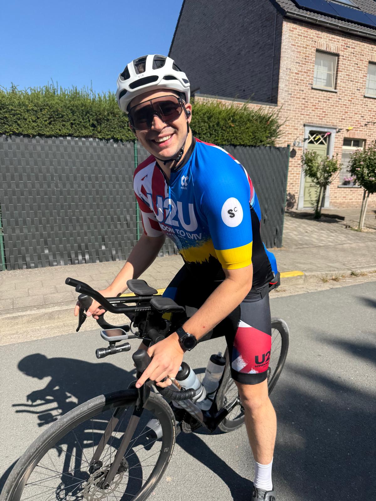 Matt smiling on his bicycle during Day 3